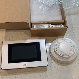 ADT Security System Control Panel and smoke/heat detector